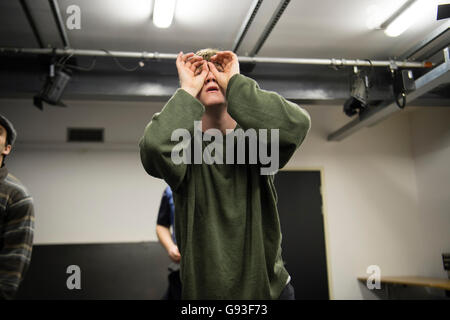 Performing arts education: Aberystwyth University undergraduate student theatre studies students  rehearsing a scene in the production of the classic television drama ; 'Blue Remembered Hills' by Dennis Potter. UK Stock Photo