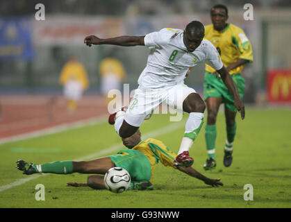 Zimbabwe's James Matola fails to tackle Senegal's Marnadou Niang Stock Photo