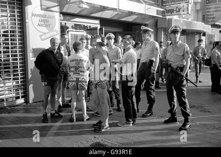 German policemen arrest a group of unruly England fans Stock Photo