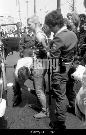 Soccer - European Championships - Euro 88 West Germany - Group Two - Netherlands v England - Rheinstadion. An England fan is arrested after England and Holland fans fought running battles in the streets of Dusseldorf before the game Stock Photo