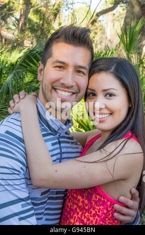 Young Hispanic Spanish couple in love portrait outside testimonial caring Model Released, MR-14, MR-22 Stock Photo