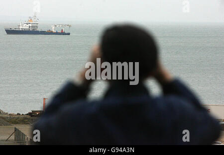 The Rising Sun fishing boat sits on board the Granuaile salvage ship, Tuesday February 7 2006, after divers worked through the night to recover the wreck which sank six miles from Kilmore Quay in Wexford in December 2005. The lobster boat, which sank last November with the loss of two crew, is taken to near Rosslare Port, by the Irish Lights vessel the Granuaile, where it will be held overnight. See SEA Salvage. PRESS ASSOCIATION Photo. Photo credit should read: Niall Carson/PA Stock Photo