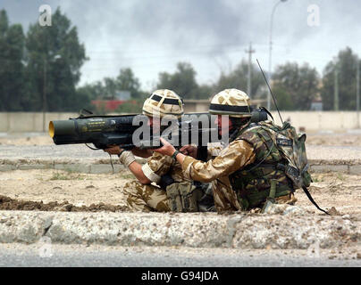 Library filer dated 06/04/2003 of 2 Company Irish Guards in action in Basra, Iraq. Opposition to British forces in Iraq is likely to increase as the time approaches for them to start withdrawing, a British commander has warned. Lieutenant Colonel James Hopkinson, the commanding officer of the 1st Battalion The Highlanders and commander of the Basra City Battle Group, said consent for the British presence would 'drop off' as they sought to disengage. See PA Story DEFENCE Iraq. PRESS ASSOCIATION Photo. Photo credit should read: PA Stock Photo