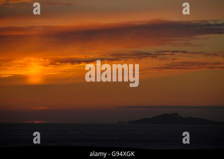 Light pillar after sunset, view from Valentia Island to Dingle Bay, Iveragh Peninsula, County Kerry, Ireland Stock Photo