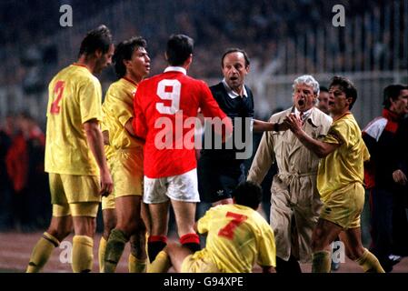 03.11.93. Eric Cantona, Manchester United is surrounded by Galatasaray players before being sent off. Picture Ross Kinnaird Stock Photo