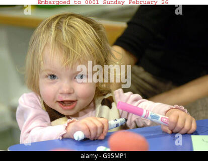 Claudia Twiby, the 18-month-old heart transplant patient, plays at Great Ormond Street Hospital for Children, London. Claudia benefited from the pioneering 'Berlin Heart', a miniature pump which helped her stay alive for 27 days while she waited for a donor heart it was revealed Sunday February 26, 2006. See PA story HEALTH Heart. PRESS ASSOCIATION Photo. Photo credit should read: Matthew Fearn/PA NOTE FOR PICTURE EDITORS: Photo taken Wednesday February 22 Stock Photo
