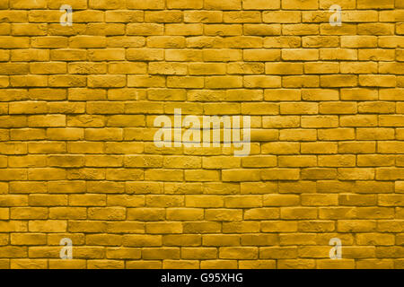 yellow gold brick wall texture color background. Stock Photo