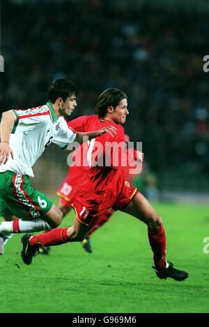 Belgium's Sandy Martens (right) tries to outpace Bulgaria's Rossen Kirilov (left) Stock Photo