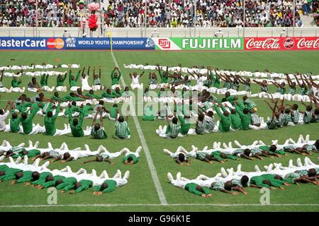 Nigerians dressed in the national colours taking part in the opening ceremony in the National Stadium, Lagos Stock Photo