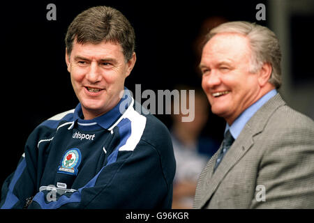 Soccer - FA Carling Premiership - Blackburn Rovers v Nottingham Forest. L-R; Brian Kidd, Blackburn Rovers' manager has a laugh with Ron Atkinson, Nottingham Forest manager before the start of the match Stock Photo