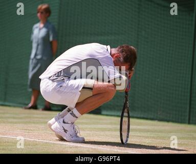 Tennis - Wimbledon . Mens singles-Patrick Rafter v Todd Martin Stock Photo