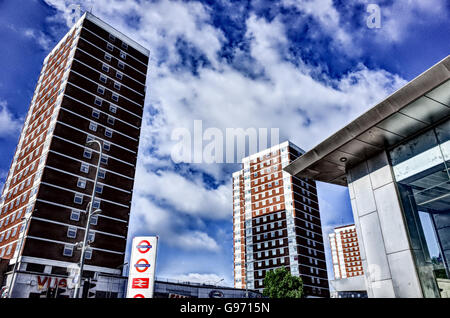 Tower Blocks and Underground Tube Station / British Rail sign against skyline Stock Photo