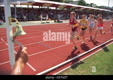 Athletics - English Schools Championships - Bury St Edmunds. The bell rings for the final lap Stock Photo