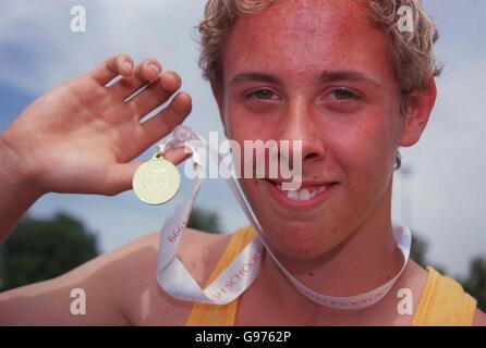 Athletics - English Schools Championships - Bury St Edmunds. Richard Dowse, 14, from Scunthorpe, North Lincolnshire and East Yorkshire, with his gold medal for the Junior Boys' 800m Stock Photo