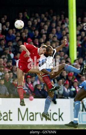 SHAUN TAYLOR (SWIN) CLASHES WITH CRYILLE REGIS (VILLA) SWINDON TOWN V ASTON VILLA FA CUP 5TH ROUND Stock Photo