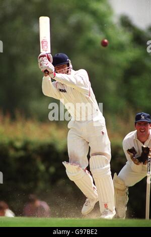 Lancashire's Mike Watkinson hits a six on his way to 130 against Hertfordshire Stock Photo