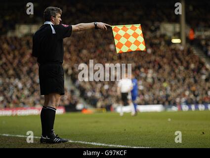 Soccer - FA Barclays Premiership - Fulham v Chelsea - Craven Cottage. Assistant referee signals for offside Stock Photo