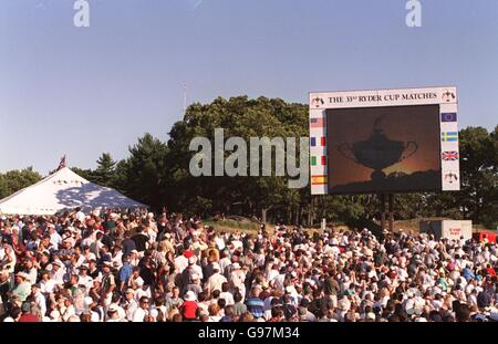 Golf - The 33rd Ryder Cup Matches - The Country Club - Brookline. Crowds watch the opening ceremony on a giant screen Stock Photo