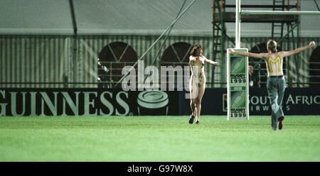 Rugby Union - Rugby World Cup 99 - Pool E - Australia v Romania. Australian streakers on the pitch during the game against Romania, despite Guinness issuing an anti-streaker kit Stock Photo