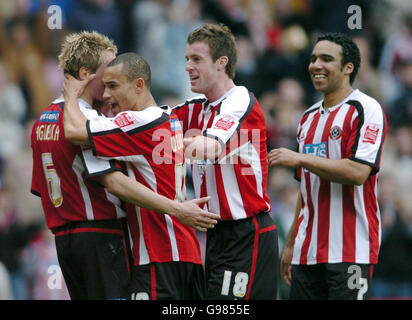 Sheffield United's Phil Jagielka (L) celebrates his goal with Danny Webber, Michael Tonge and Paul Ifill during the Coca-Cola Championship match against Southampton at Bramall Lane, Sheffield, Saturday March 25, 2006. PRESS ASSOCIATION Photo. Photo credit should read: PA. NO UNOFFICIAL CLUB WEBSITE USE. Stock Photo