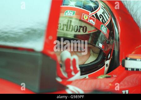 Formula One Motor Racing - Malaysian Grand Prix - Practice. Michael Schumacher watches the times during practice Stock Photo