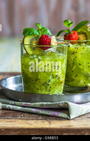 Green vodka, kiwi and lime cocktail Stock Photo