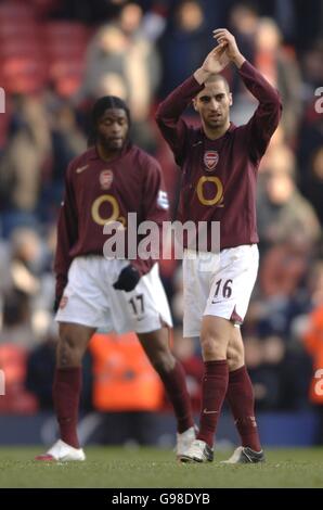 Arsenal's Mathieu Flamini applauds the fans after the Barclays Premier ...