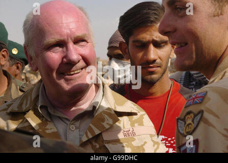 British Defence Secretary John Reid meets military personnel from the British Army and Royal Air Force as well as soldiers from the Afghan National Army at Camp Bastion in southern Afghanistan. Stock Photo