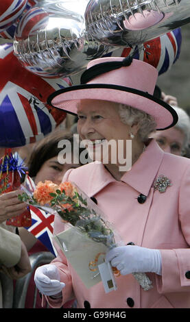 Britain's Queen Elizabeth II greets well-wishers as she tours the renovated Oxford Castle and Prison in Oxford, England Friday May 5, 2006. The 19th century Oxford Prison has been converted into a hotel. (AP Photo/Alastair Grant, Pool) Stock Photo