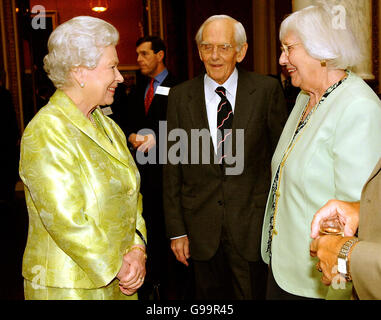 Britain's Queen Elizabeth II chats with Diana Davis from Sidmouth, Devon, in the Picture Gallery of Buckingham Palace during an 80th birthday lunch. Stock Photo