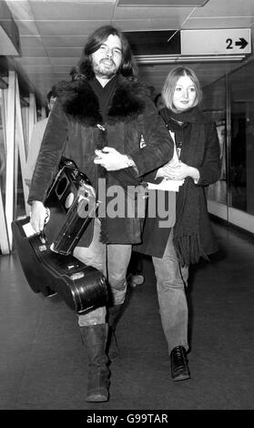 Welsh pop singer, Mary Hopkin, who claims to have shed her little girl image, arrives with her husband, American record producer, Tony Visconti, 27. Stock Photo