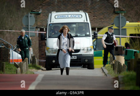 Police officers at St Georges Hospital in Hornchurch, Essex, Thursday April 6, 2006, where a nurse was stabbed to death earlier. Detectives have launched a murder inquiry following the fatal stabbing. The victim, a woman in her 30s, was stabbed in the grounds of the hospital in Suttons Lane, Hornchurch, Essex. She was found by fellow members of staff in a garden-type area at the rear of the hospital just after 11am today. See PA story POLICE Nurse. Stock Photo
