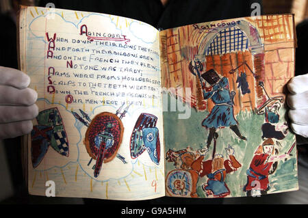 A page entitled 'Agincourt' from John Lennon's illustrated schoolbook, 'Anthology', on show in London ahead of its auction later this month. Stock Photo