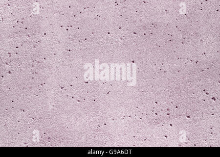 Light-colored sandstone with small holes as wallpaper Stock Photo