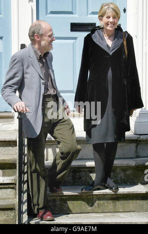 John Farrant with his pregnant 63-year-old wife Patricia Rashbrook pose ... photo