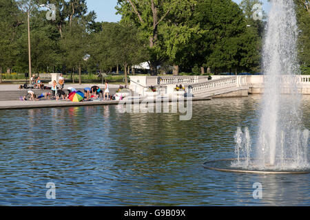 Bottom of Grand Basin at Forest Park in St. Louis. Musicians playing music for yoga class. Stock Photo