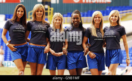 (From the left) Leilani Dowding girlfriend of Jeremie Aliadiere, Danielle Lloyd partner of Teddy Sheringham, Melanie Slade, the girlfriend of England footballer Theo Walcott, Michelle Gayle wife of Mark Bright, Kimberley Mills fiancee of David Bentley, and Suzi Walker wife of Ian Walker, at a press photocall for Cancer Research's Race For Life at Tottenham Hotspurs ground White Hart Lane in London. Stock Photo