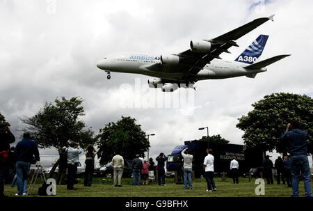 The world's largest passenger plane, the 555-seater Airbus A380 superjumbo, touches down safely at Heathrow Airport. Stock Photo