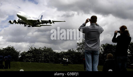 The world's largest passenger plane, the 555-seater Airbus A380 superjumbo, touches down safely at Heathrow Airport. Stock Photo