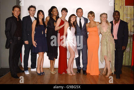 Members of the cast of EastEnders, from left; Joe Swash, Matt Di Angelo, Lacey Turner, Tiana Bejamin, Emma Barton, Louisa Lytton, Joel Beckett, Kara Tointon, Kellie Shirley and Mohammed George, at the Cobden Club in west London before they attend the British Soap Awards. Stock Photo