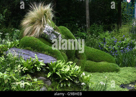A sculpture reclines at the centre piece of the 4head Garden of Dreams stand at The Chelsea Flower Show, in west London. PRESS ASSOCIATION Photo. Issue date: Monday May 22, 2006. PRESS ASSOCIATION Photo. Photo credit should read: Chris Young/PA Stock Photo