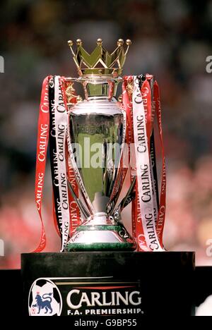 The FA Carling Premiership trophy, with ribbons tied in red , white and ...