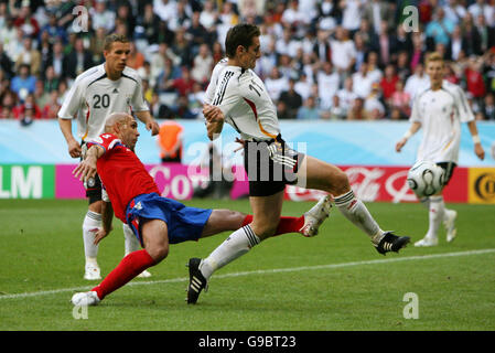 Germany's Miroslav Klose (C) scores the third goal against Costa Rica during the Group A World Cup match at the FIFA World Cup Stadium, Munich, Germany. Stock Photo