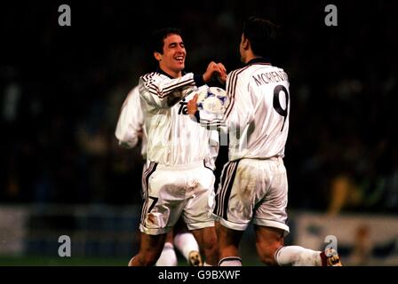 Soccer - UEFA Champions League - Group C - Real Madrid v Bayern Munich. Real Madrid's Raul (l) congratulates teammate Fernando Morientes (r) on pulling a goal back Stock Photo