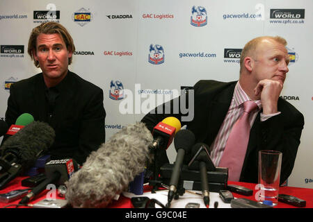 Crystal Palace owner Simon Jordan Iain Dowie (R) talk to the media to announce that he is to leave the club as manager by mutual consent during a press conference at Selhurst Park, London. Stock Photo