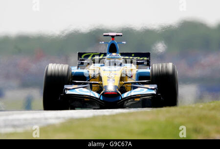 Spain's Fernando Alonso in his Renault exits Abbey during the British Grand Prix at Silverstone. Stock Photo