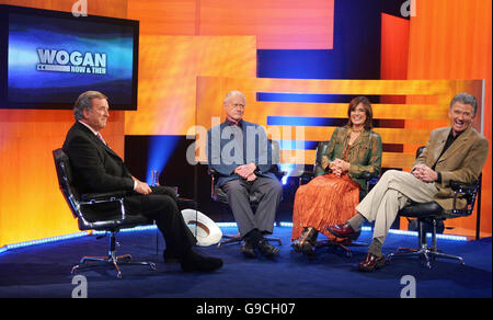 Sir Terry Wogan (left) with the three longest serving cast members of Dallas, Larry Hagman (second left) who played the character J.R. , Patrick Duffy (right) who played Bobby Ewing, and Linda Gray who played Sue Ellen, at the BBC Television Centre in Shepherd's Bush, London. Stock Photo