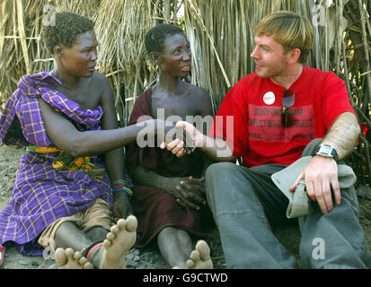 Embargoed to 0001 Monday June 19 David Grimason talks to two women from Kambo-Miti village Kenya, No Poeta (left) lost her husband and four children after an Ethiopian raiders attack and Ewoton Amudangi who lost her husband and three children in the same attack. Stock Photo