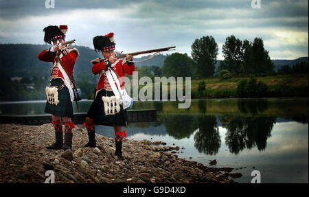 Simon Betts and Keith Gregory wear an 1815 Black Watch uniform as they prepare for The Game Conservancy Scottish Fair this weekend at Scone Palace, Perthshire. Stock Photo