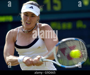 Switzerland's Martina Hingis in action against Japan's Ai Sugiyama during the third round of The All England Lawn Tennis Championships at Wimbledon. Stock Photo